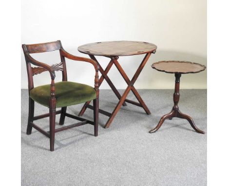 A 19th century teak folding butler's tray, on a later folding stand, 91cm wide, together with a Regency armchair and a tripod