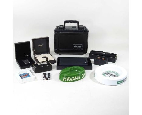 A Xikar humidor, with cigars, an S T Dupont lighter, cased, a Dunhill pen, a Dunhill lighter, cased, cufflinks, a Dunhill wal