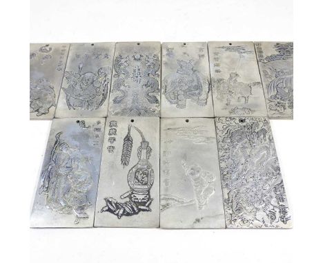 A set of Chinese white metal scroll weights