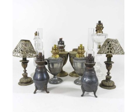 Four pairs of small metal oil lamp bases, together with two cut glass lamps, highest 36cm (10)