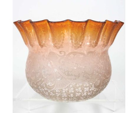 A peach coloured etched glass oil lamp shade, 13cm high