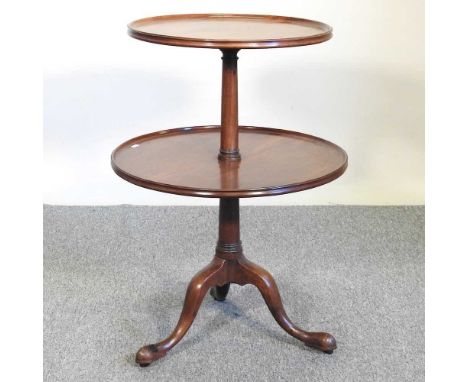 A George III mahogany two tier dumb waiter, on a tripod base56w x 80h cm