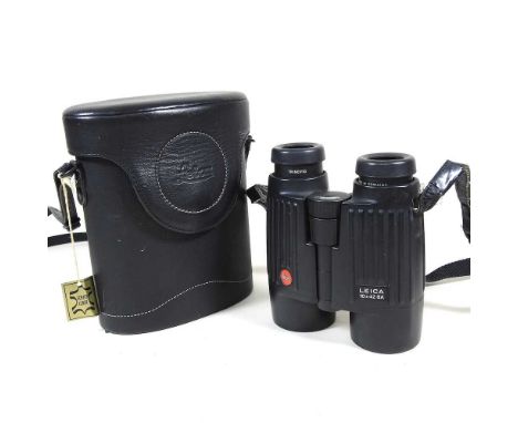 A pair of Leica 10 x 42 BA binoculars, casedOverall condition is complete and usable. Some light signs of use to the strap, c