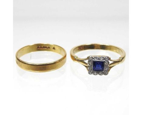 An 18 carat gold and platinum set sapphire and diamond cluster ring, 3g, size P, together with an 18 carat gold wedding band,