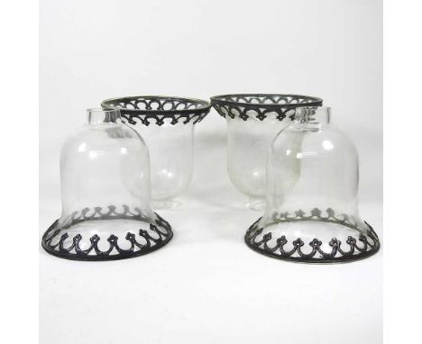 A set of four storm lantern shades, each of bell shape, with a metal rim, 4cm aperture (4)Very dirty, but appear to be comple