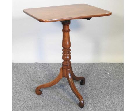 A 19th century mahogany occasional table, with a hinged top, on a tripod base60w x 50d x 75h cm