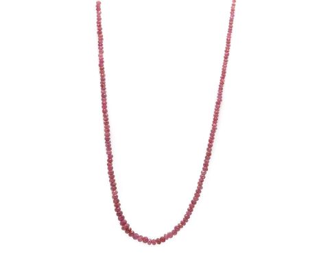 A graduated faceted ruby bead necklace, the beads approximately 2.40 to 5.50mm wide, strung plain to a gold bolt ring clasp, 