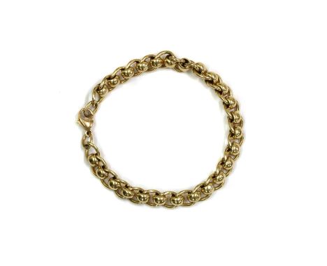 A 9ct gold curb and roller link bracelet, with side lever clasp, Birmingham, 210mm long, 22.89gCondition ReportVery minor sur