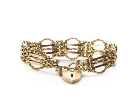 A 9ct gold gate bracelet, centre twisted bars, with a plain bar either side, and outer curved crimped bars, to heart shaped p