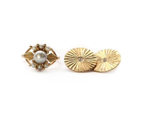 A gold cultured pearl cluster ring,with split shoulders and a reeded shank, tested as approximately 18ct gold, together with 