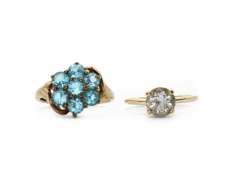 Two gold rings,comprising a 14ct gold single stone cubic zirconia ring, Birmingham 2004, 2.08g, and a 9ct gold blue topaz clu