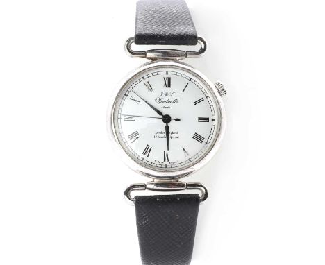 A silver Joseph and Thomas Windmills mechanical 1st edition strap watch, 31mm diameter, with a white enamel dial, black Roman