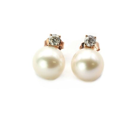 A pair of rose gold cultured freshwater pearl and diamond stud earrings, a cultured freshwater pearl, approximately 9.1-9.2mm