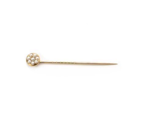 A gold diamond and split pearl stick pin, the removable finial with a Swiss cut diamond grain set at the centre, to surround 