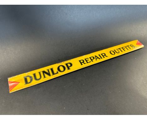 A Dunlop Repair Outfits shelf strip in good condition.