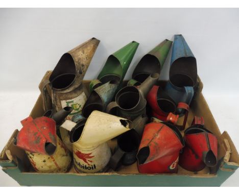 A good quantity of assorted oil measures including Shell, Esso, Mobil etc.