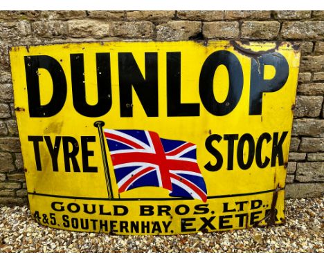 A large Dunlop Tyre Stock enamel sign with garage name Gould Bros Ltd. 4 &amp; 5 Southernhay, Exeter, 72 x 48".