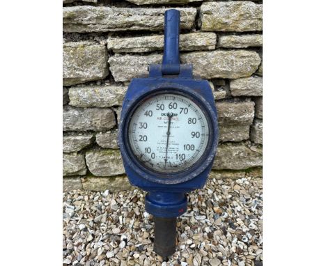 A Dunlop air control gauge, post mounted but lacking base.