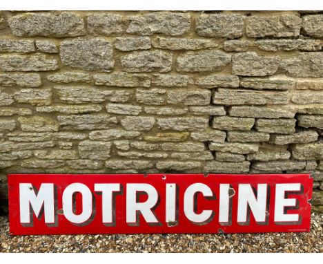 A Continental enamel sign advertising Motricine, 77 x 16 1/2".
