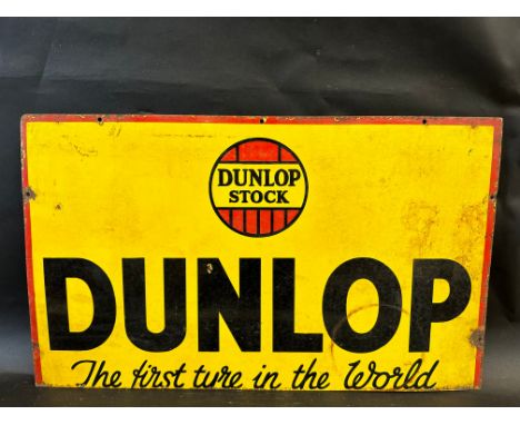 A Dunlop Stock rectangular enamel sign (trimmed along bottom edge), 30 x 18".