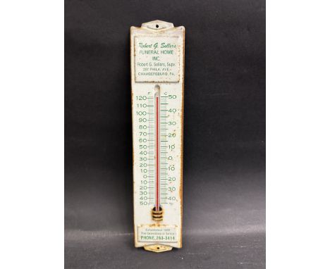 An unusual tin fronted thermometer advertising Robert Sellers funeral home.