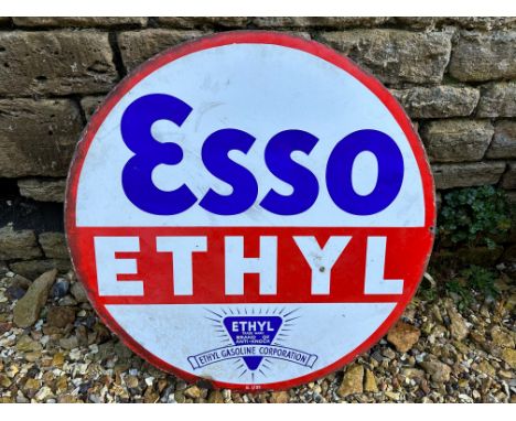 An Esso Ethyl circular double sided enamel sign dated 1935, 30" diameter.