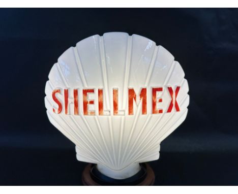 A Shellmex glass petrol pump globe by Hailware, chips to neck hidden by rubber ring.