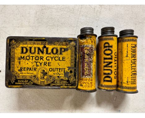 A small group of early Dunlop puncture repair tins.