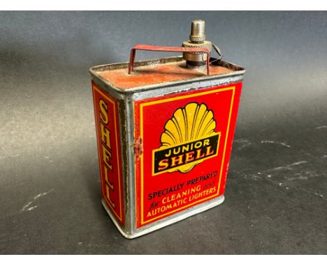A Shell Junior lighter fluid tin in excellent condition including original lead seal in the shape of a clam shell.
