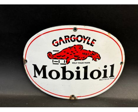 A Gargoyle Mobiloil oval convex enamel sign with good gloss, 11 x 8". 