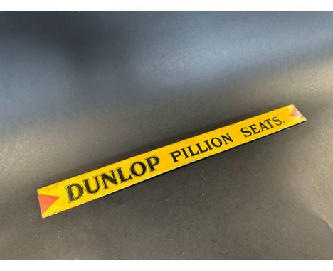 A Dunlop Pillion Seats shelf strip in good condition.