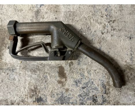 A bronze petrol pump trigger nozzle.