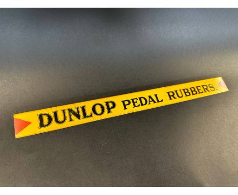 A Dunlop Pedal Rubbers shelf strip in good condition.