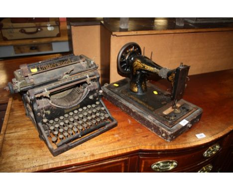 A VINTAGE UNDERWOOD TYPEWRITER AND A SINGER SEWING MACHINE (2) A/F