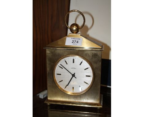 AN ANGELUS MANTLE CLOCK PRESENTED TO DR DUDLEY A. IRELAND 