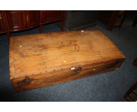 A VINTAGE LOW PINE BOX WITH CURVED LID H -27 CM L - 137 CM A/F