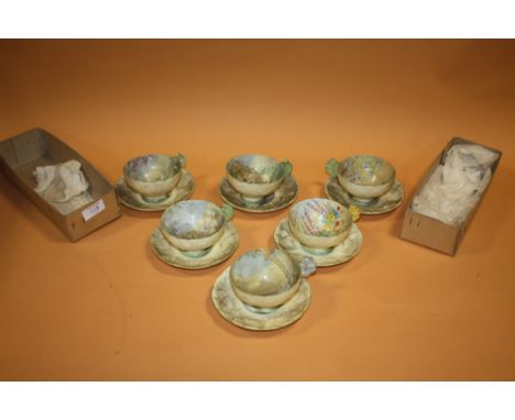 A SET OF SIX ROYAL PARAGON ART DECO  FLOWER HANDLED CUPS AND SAUCERS