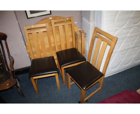 A MODERN LIGHT OAK CIRCULAR TABLE AND 3 CHAIRS