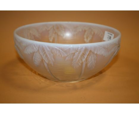 A FROSTED GLASS BOWL DECORATED WITH PALM TREES IN RELIEF IN THE STYLE OF LALIQUE