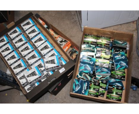 THREE TRAYS OF ASSORTED ITEMS TO INCLUDE, RAZORS AND BLADES, LIGHT BULBS AND A MIXED TRAY (3)
