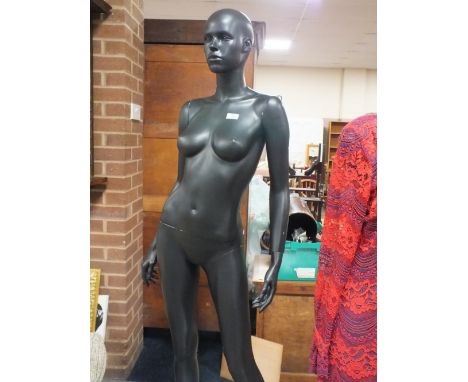 A RETAIL FULL BODY STANDING FEMALE SHOP / WINDOW DISPLAY MANNEQUIN ON STAND