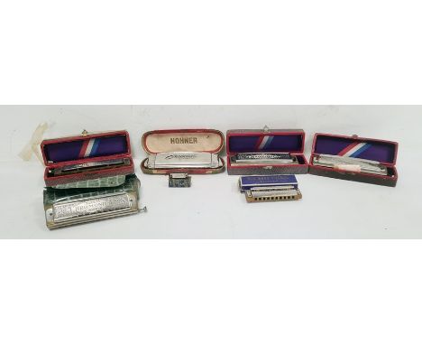 Collection of seven assorted harmonicas including three Hohner Super Chromonica (all boxed), a Hohner Echo Super Vamper and a