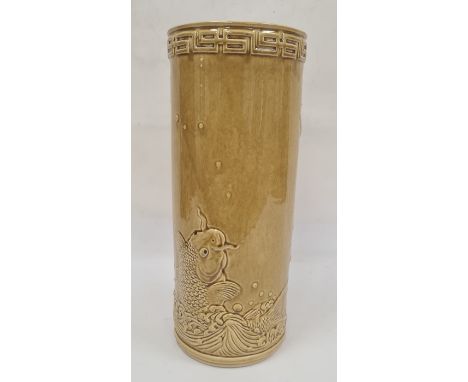 Late Victorian majolica glazed stick stand, cylindrical with key border and decorated in relief with carp, 45.5cm high