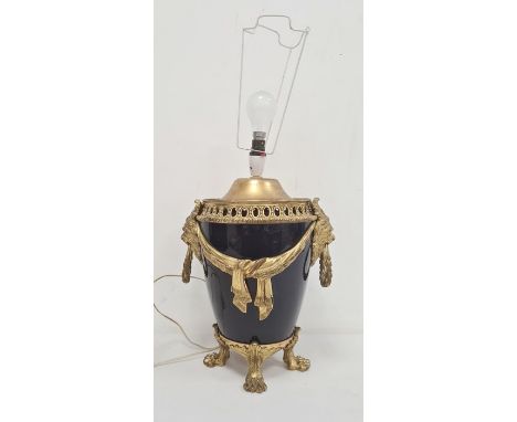 Gilt metal mounted royal blue china table lamp with pierced arched border, pair lion mask and wreath handles, fabric swags to