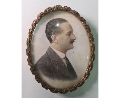 Early 20th century schoolWatercolour miniatureHead and shoulders portrait of a gentleman in a suit, taken side on, oval, 10 x