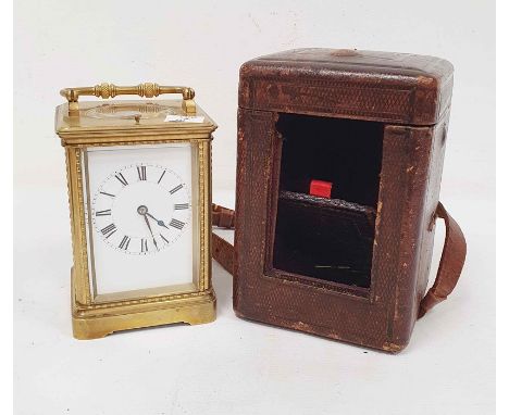 Brass and glass carriage clock with Roman numerals to the dial, in carry case Condition ReportPlease see added photo's. There