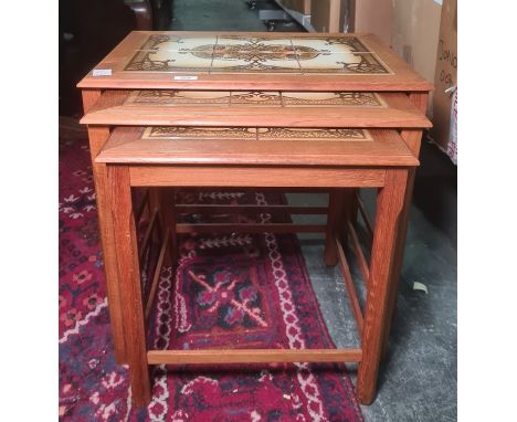 Mid 20th century nest of three tile-top coffee tables