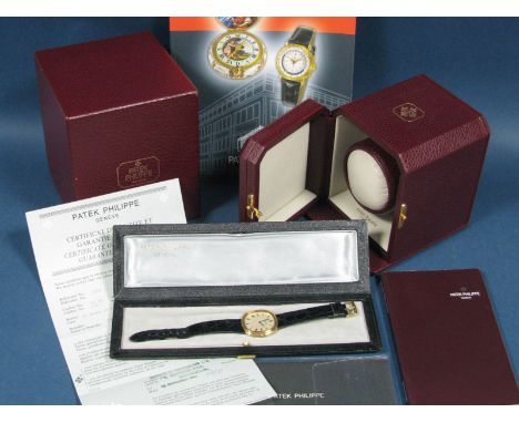 Patek Philippe; A 1970's 18ct Gold Cased Automatic Gent's Wristwatch, the signed cushion shape dial with black Roman numerals