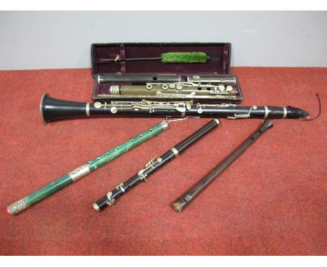 A Moennig Ebony Clarinet, No. 42870; A Rosewood Fipple; A Chinese Hardstone Flute, with plated mounts; A Boosey & Hawkes Plas