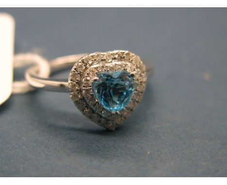 A Modern Diamond Set Heart Shape Dress Ring, stamped "9k". 